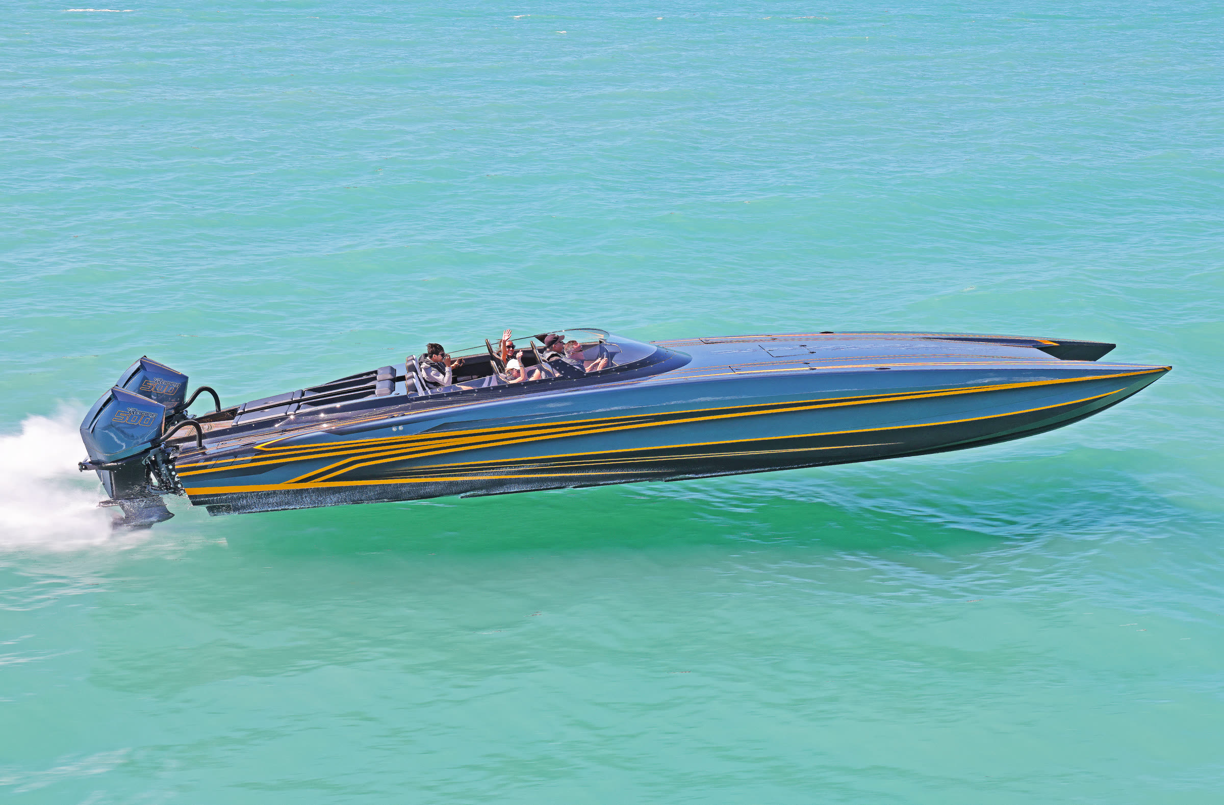 The Platinum 428 at speed, twin Mercury Racing 500R outboards on the transom