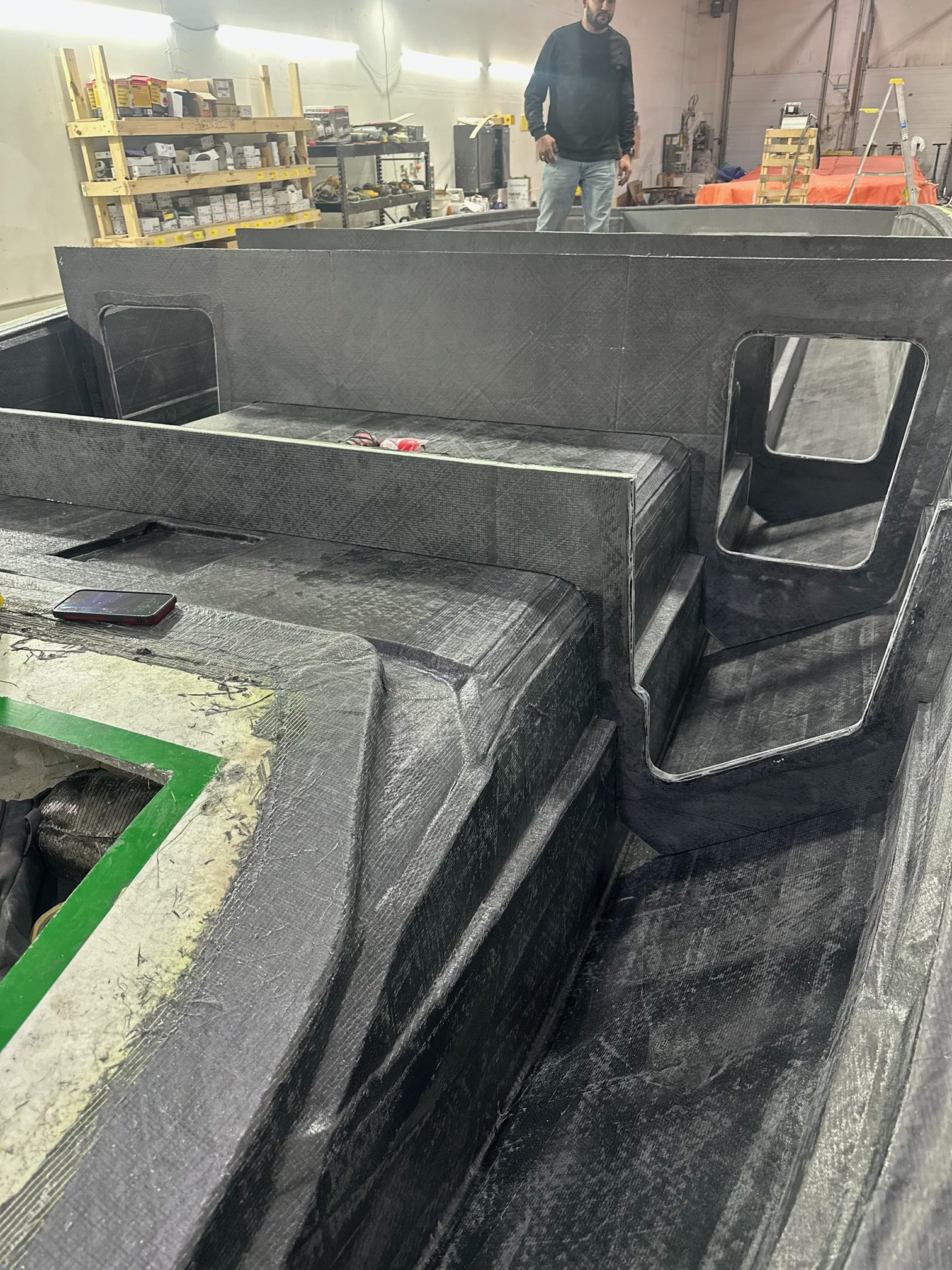 Raw carbon fiber canopied cockpit of the Platinum 428 R under construction