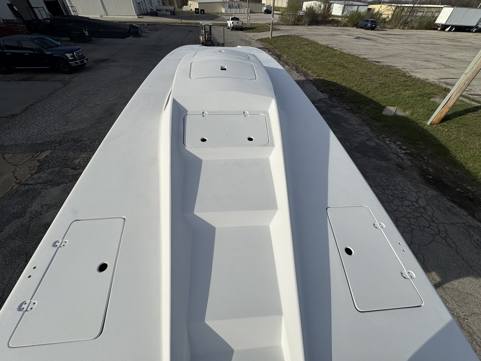 428 R deck in primer viewed from the bow